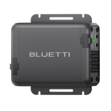 BLUETTI Charger 1 from the opposite side, with the green status light lit beside the ventilation slots