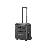 BLUETTI Elite 400 from the front right with its telescopic handle extended, showing the wheels, side handle and labelled front panel