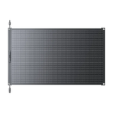 BLUETTI PV100 FX flexible solar panel from the front, showing the monocrystalline cell grid, corner mounting grommets and the MC4 output leads on the left edge