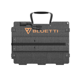 The BLUETTI SORA-500 folded into its carry case with the handle upright and the BLUETTI logo on the front
